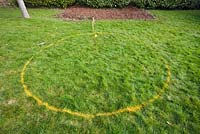 Constructing a circular deck - deck circle marked out using yellow spray paint