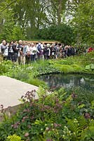 Crowds visiting the RHS Chelsea Flower Show. No Man's Land Garden 