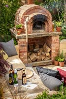 Sunken seating area with brick pizza oven, 'A Fruity Story', show garden, RHS Malvern Spring Festival 2014