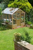 Greenhouse in garden setting