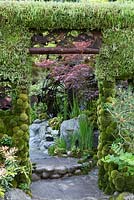 Moss arch in shady Japanese themed garden - Togenkyo - A Paradise on Earth - Designer Kazuyuki Ishihara - RHS Chelsea Flower Show 2014 
 