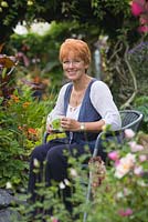 Owner of The Secret Garden of Louth - Jenny Grasham. Lincolnshire. August 2014. Summer.