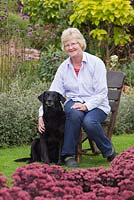 Garden owner Helen Boothman, with her dog Lucy.  September, Autumn 2014.