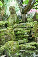 Arrangement of moss covered stones. The Japanese Garden and Bonsai Nursery, St.Mawgan, nr Newquay, Cornwall 