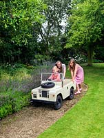 Scarlet 12,  Olivia 7 and Maja 13 taking the toy Landrover for a spin.