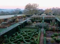 An overhead view of the formal knot garden, composed of box hedging, pyramids and balls. Garden rooms are created by yew and beech hedges.