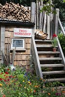 A Trugmaker's Garden, celebrating the dying artisan craftsmanship of Sussex trugmakers. RHS Chelsea Flower Show 2015
