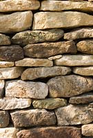 Detail of a dry stone wall using old and new stones