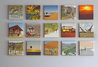 African safari family canvases mounted on a wall 