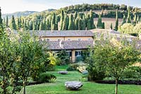 The Fattoria, Villa La Foce, near Chianciano Terme, Siena, Tuscany, Italy. October. Iris and Antonio Origo commissioned English architect Cecil Pinsent to design the garden which was built between 1927 and 1939 in the Renaissance Revival style.  