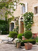 Garden in Luberon, France, Designed by Michel Semini: The front door of the house - Wasserman garden