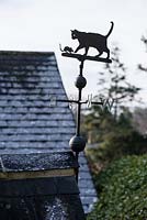 Cat and mouse weather vane.