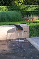 Contemporary water feature, box hedging. The Laurent-Perrier Garden. Design: Luciano Giubbilei, Gold Medal winner, Chelsea 2009