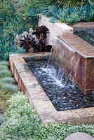 Modern water feature. Debora Carl's garden, Encinitas, California, USA. August.