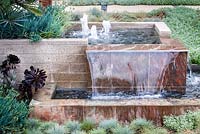 Modern water feature. Debora Carl's garden, Encinitas, California, USA. August.