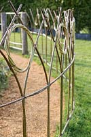 Detail of willow fencing - Gardening Amidst Ruins: A Homage to Capability Brown, RHS Malvern Spring Festival 2016