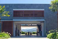 View through the modern house at Bhudevi Estate garden,   Marlborough, New Zealand.