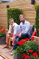 Ben de Lisi and partner Gerardo Vidaurre relaxing in their London garden