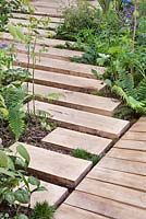 Stepping beams. The Garden of Potential. RHS Chelsea Flower Show 2016. Designer: Propagating Dan, Sponsors: Greenwood Forest Park