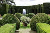 Villa Gamberaia, Settignano, Florence, Tuscany, Italy. Formal Italianate garden with clipped topiary parterre and Cypress arcade