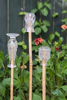 Glass vases used as cane toppers