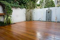 Overall view of decking in small urban garden, finsihed project