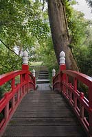Red painted wooden bridge showing non slip tread - June, Clyne Gardens, Swansea, Wales