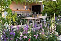 Inspired by Scandinavian design, a contemporary outdoor living space enclosed in perennials in soft pastel shades. The LG Smart Garden, Designer Hay Joung Hwang, RHS Chelsea Flower Show 2016