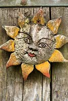 Wooden sun. De Luie Tuinman