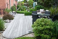 Hardwood deck in suburban back garden 