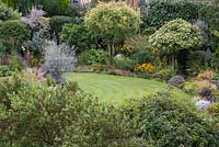 Overview of lower garden with mixed borders