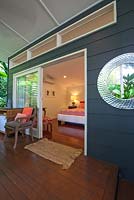 Exterior of B and B in tropical northern Australia looking into bedroom