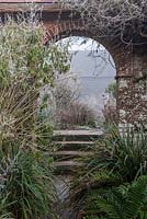 Brock Arch in The Walled Garden at Great Dixter in Winter