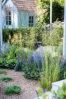 Flower bed with Perovskia 'Lacey Blue', Verbascum 'Clementine', Deschampsia cespitosa 'Goldtau'. Retreat Garden. Designer: Martin Royer, Sponsor: Final5 