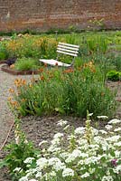 Bench next to the summer borders