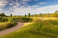 The Italian Garden at Trentham Gardens, Staffordshire - designed by Tom Stuart-Smith. Planting includes clipped box hedges, Knautia macedonica and fastigate Irish yews