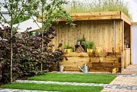 Wooden Shed in Health for Life Community Garden. Best In Show: GOLD. BBC Gardeners World Live 2016 . Designer: Owen Morgan. RHS Flower Show Birmingham