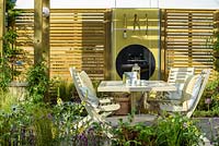 Seating Area. The Green Connection Garden by Jacksons Fencing, BBC Gardeners World Live 2016, Designers: Wardrop 