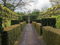 The Laskett Gardens- The Elizabeth Tudor walk with Taxus Baccata hedging and topiary complimented with Pleached Lime trees leading the eye to Shakespeare monument