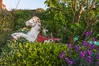 Rocking horse - Driftwood garden in May
