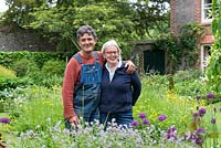Jim Buckland and Sarah Wain in their fifth-of-an-acre garden in late spring.
