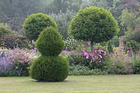 Lawn and border with topiary