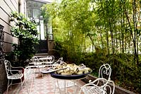 Seating area on terrace. Villa Singer Garden. Milan. Italy