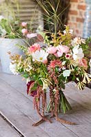 Floral arrangement with Amaranthus, Cosmos, Dahlia, Roses and foliage