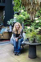 Abigail Ahern, designer in her garden. Hackney, London
