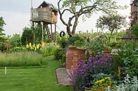 Summer planting with tree house retreat