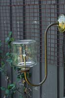 Outdoor lamp fitting made from old kerosene bottle and recycled materials