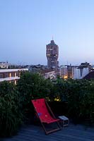 View from terrace to city of Milan and Velasca tower, Italy, May.