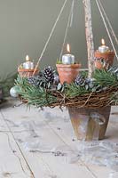Rustic advent candle holder lit