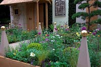 Walker's pine cottage garden Designer - s - : Graham Bodle Contractor: Walkers Nurseries RHS Chelsea flower show 2013 Silver award